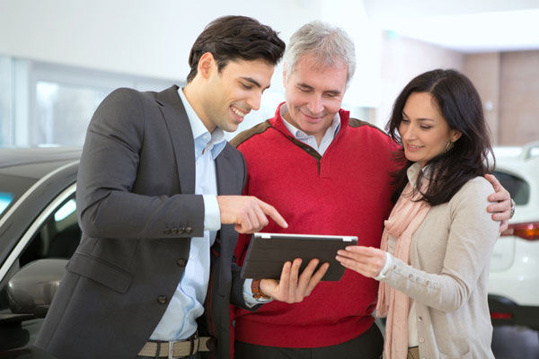 Salesperson talking to couple