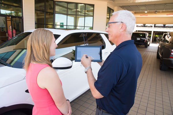 Salesperson talking to customer