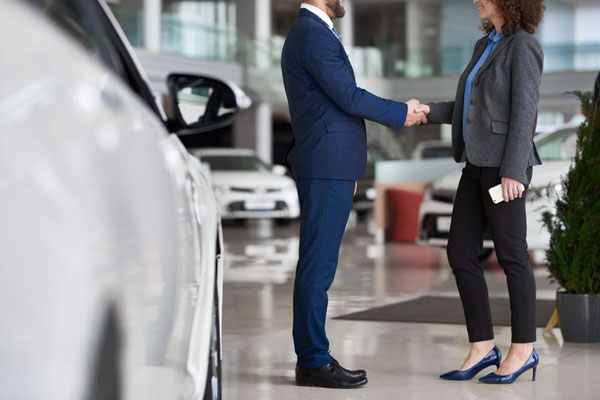 Man and woman shaking hands