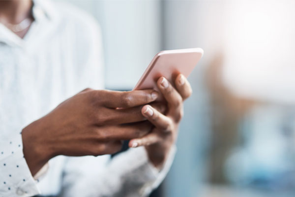 Woman holding mobile phone