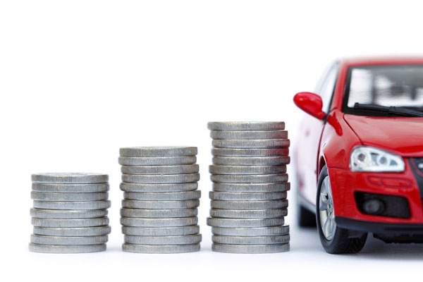 Pile of coins next to vehicle