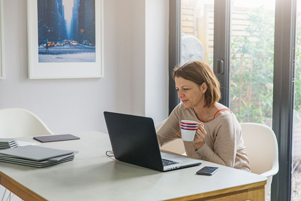 Woman on laptop at home