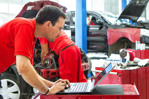 Technician looking at monitor