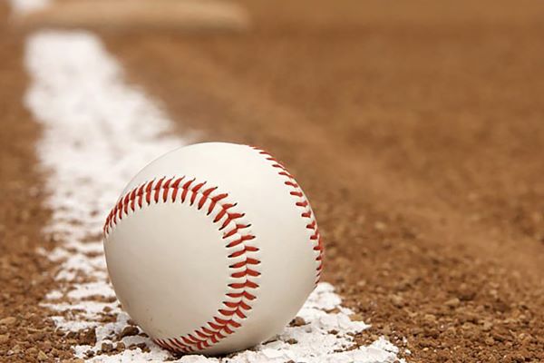 Baseball resting on foul line